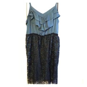 Blue dress with black lace overlay on the bottom.